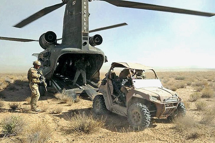 special-forces-atv-US-DoD-Photo-by-Spc.-Jesse-LaMorte,-Special-Operations-Task-Force---South-Special-Forces-Soldiers-with-Special-Operations-Task-Force---South-prepare-to-load-an-all-terrain-vehicle-(ATV)-onto-a-C