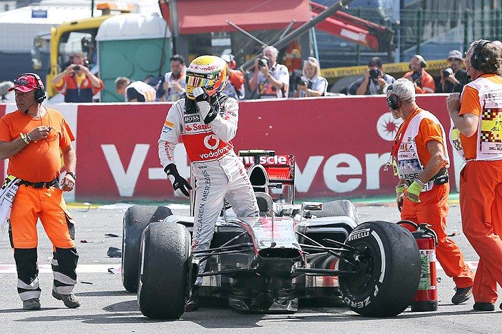 British Formula One driver Lewis Hamilton of McLaren Mercedes gets out of his car after the crash during the start of the 2012 Belgium Formula One Grand Prix