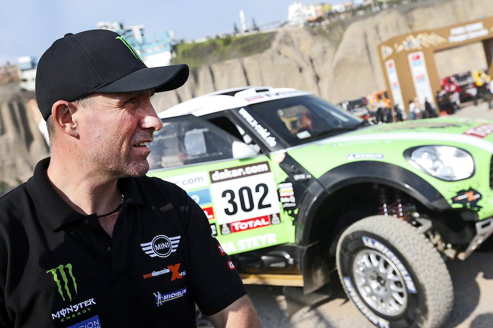 French pilot Stephane Peterhansel attends a technical event a day before the first stage of the Rally Dakar 2013 in Lima, Peru
