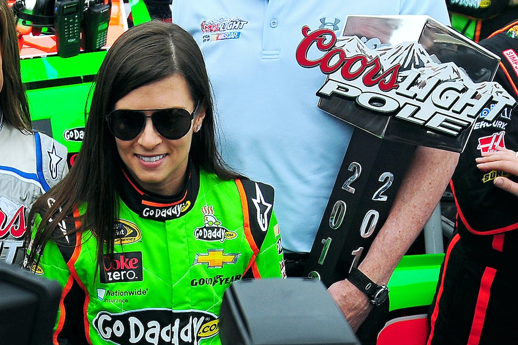 NASCAR Sprint Cup Series driver Danica Patrick stands near her car prior to the start of the Daytona 500 at Daytona International Speedway in Daytona Beach