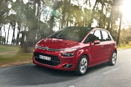 Citroën C4 Picasso rot fahrens Seitenansicht