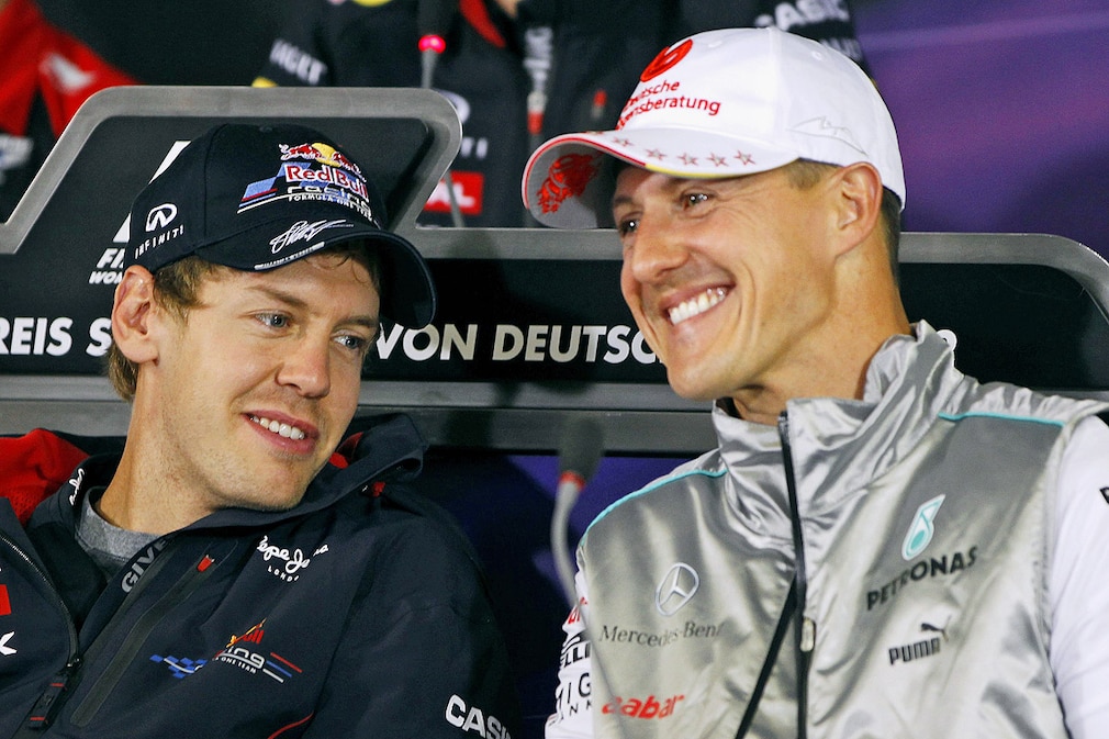 Sebastian VETTEL und Michael SCHUMACHER 2012 auf dem Hockenheimring