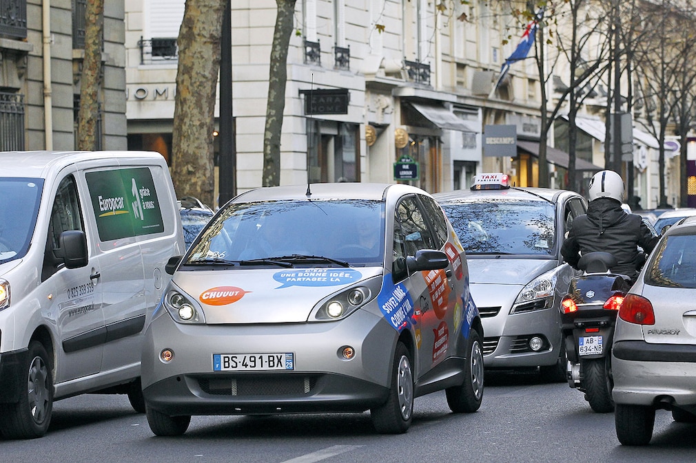 Paris shows an Autolib electric bluecar in a street of Paris, on the day of the official presentation of this public system of self-service, point-to-point electric rental cars, starting on December 5, 2011. 250 cars 