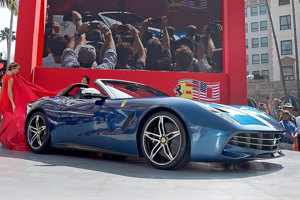 The Ferrari F60 is unveiled Ferrari during the 'Race through the Decades 1954-2014' event on Rodeo Drive in Beverly Hills, California, USA, 12 October 2014. The event celebrates Ferrari's 60th anniversary in the United States.