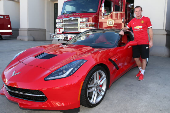 Wayne Rooney mit einer Corvette