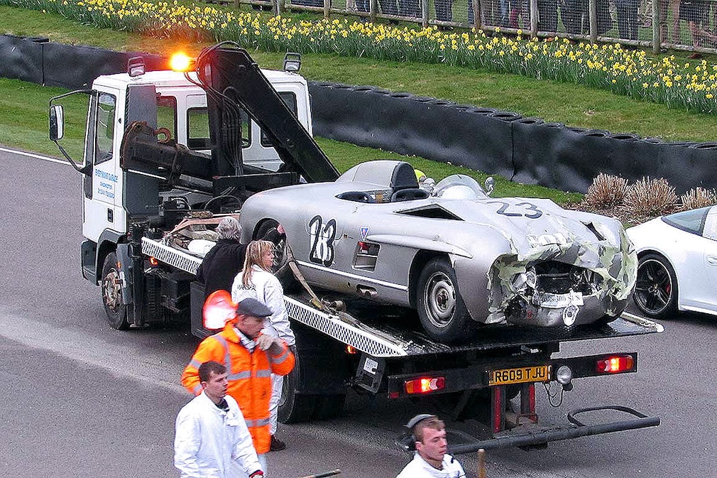 Jaguar and Mercedes crash at Goodwood