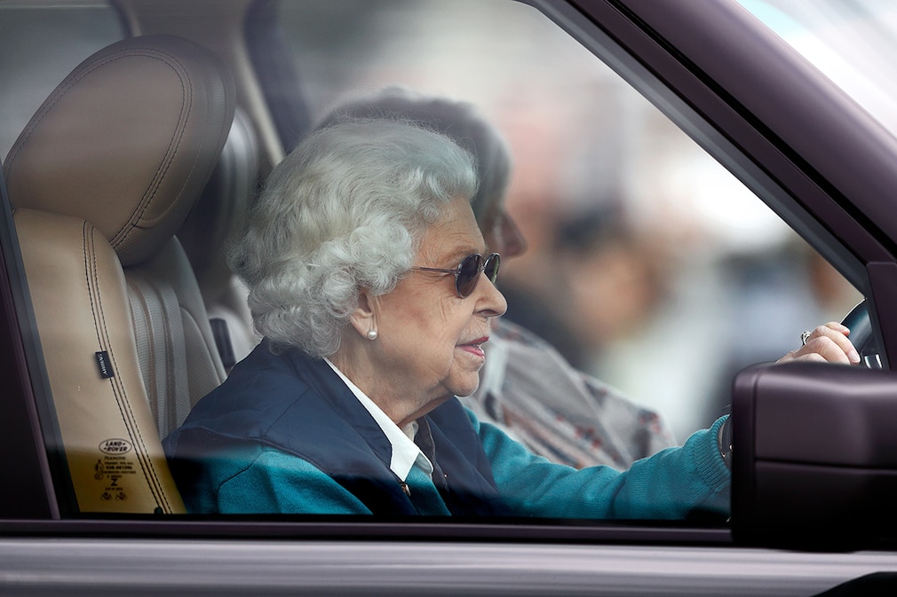 Queen Elizabeth II seen driving her Range Rover car as she attends day 2 of the Royal Windsor Horse Show at Home Park, Windsor Castle on July 2, 2021