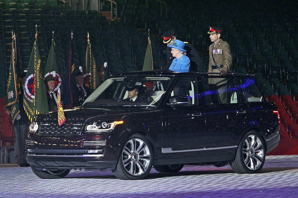 Her Majesty The Queen inspect's troops from The Royal Welsh in her new open top range rover as the attend's the Colours Parade for The Royal Welsh at the Millennium Stadium