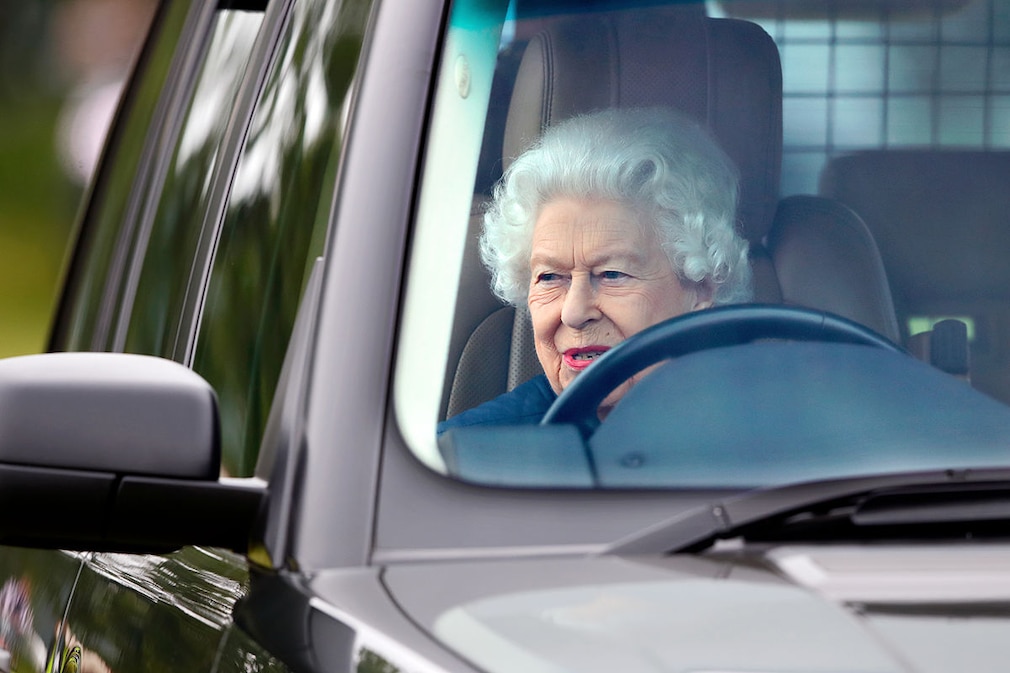 Queen Elizabeth II seen driving her Range Rover car as she attends day 2 of the Royal Windsor Horse Show in Home Park, Windsor Castle on July 2, 2021