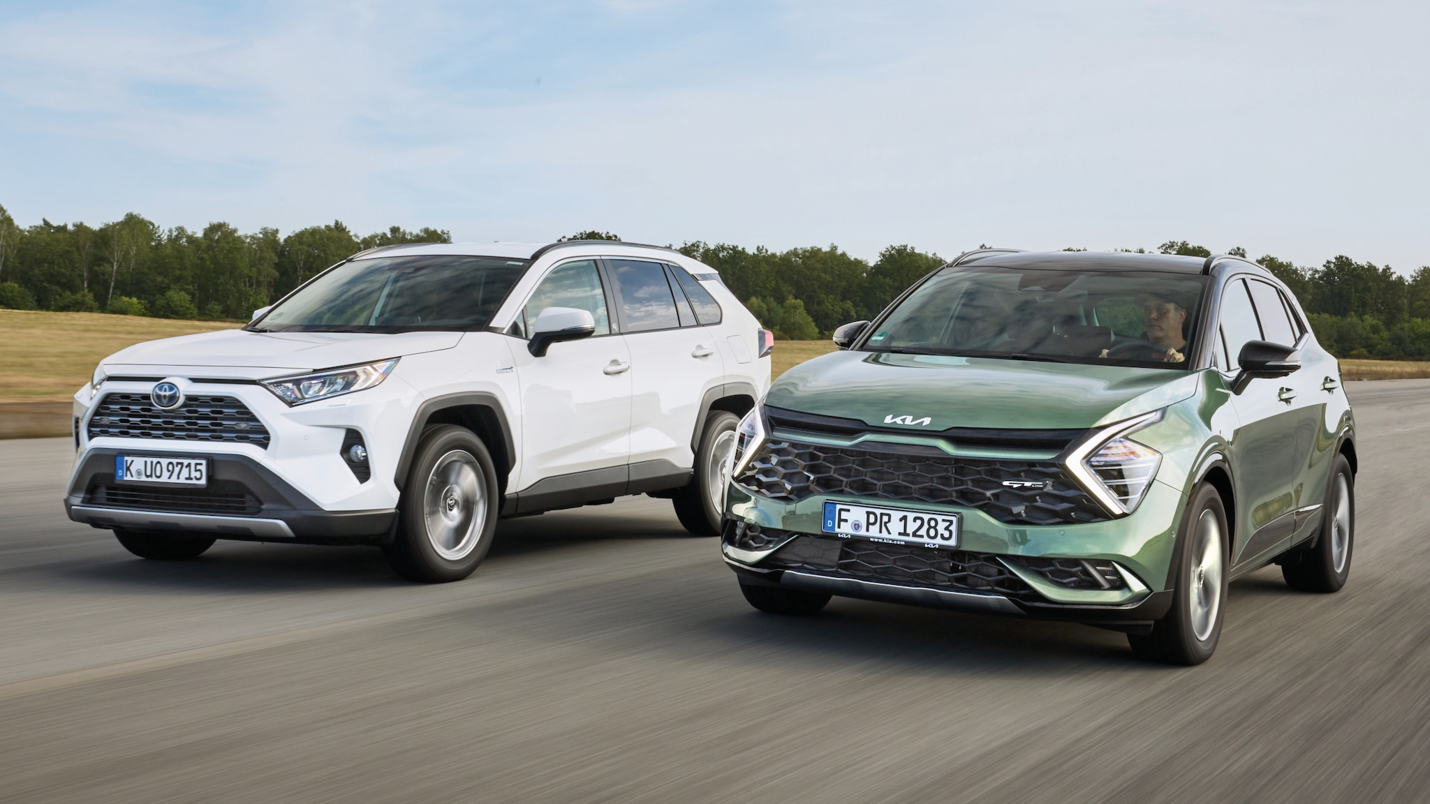Kia Sportage vs. Toyota RAV4 zwei VollhybridSUV im Test AUTO BILD