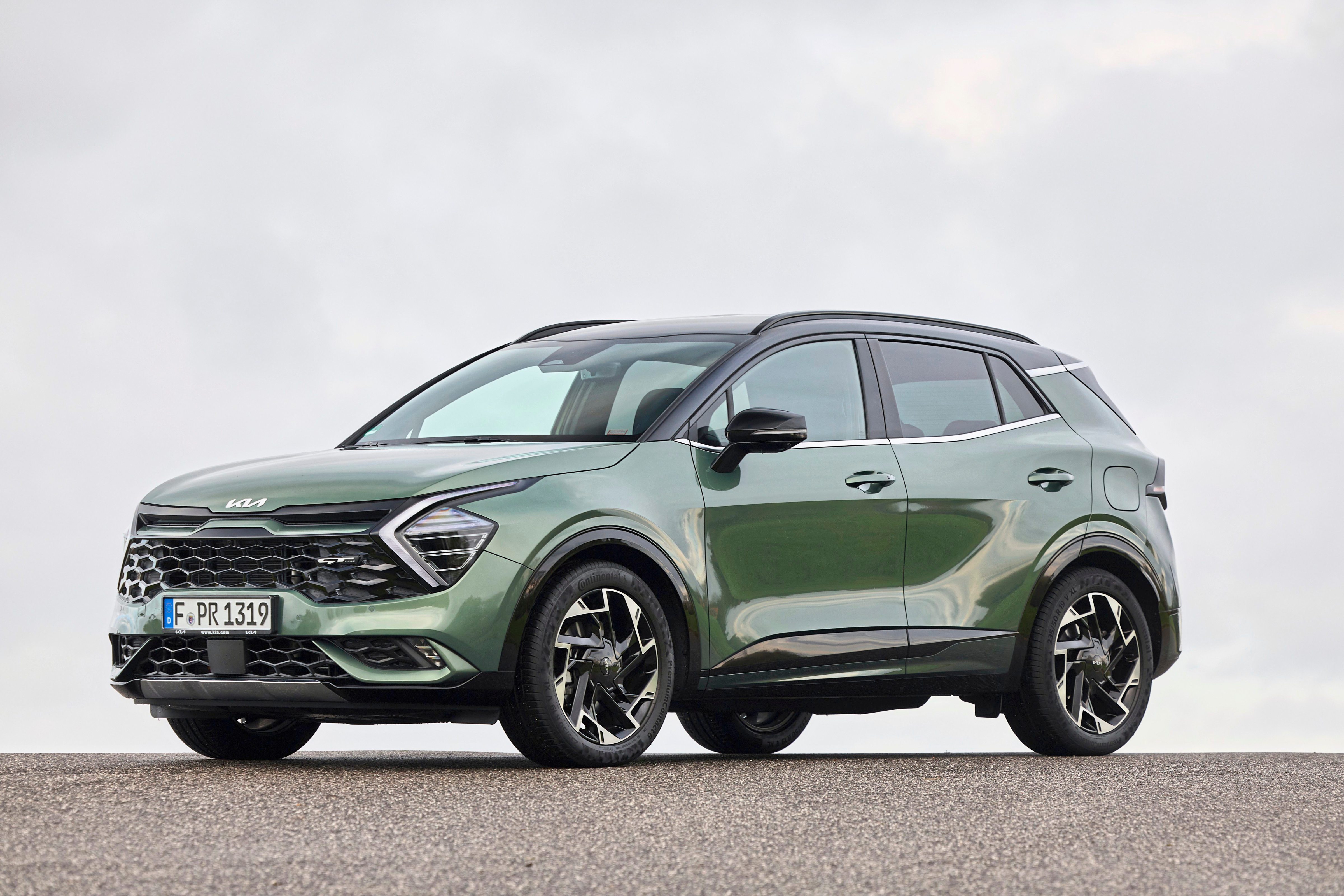 Blaugrüner Kia Sportage ab 2000