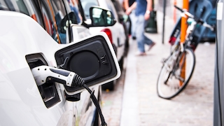 Electric car being charged
