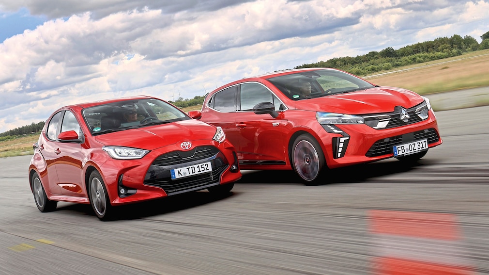 Mitsubishi Colt Hybrid 1.6  Toyota Yaris Hybrid 116