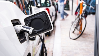 Electric car being charged