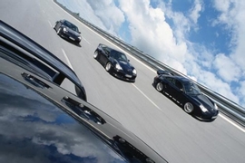 Vier getunte Porsche Turbo