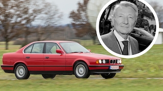 Portraitfoto von Ercole Spada mit Foto eines BMW Fünfer (E34) schräg von der Seite