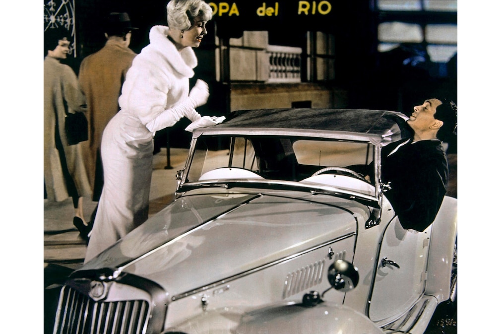 Filmszene: Doris Day, ein MG TF Roaster (T-Type) und Rock Hudson