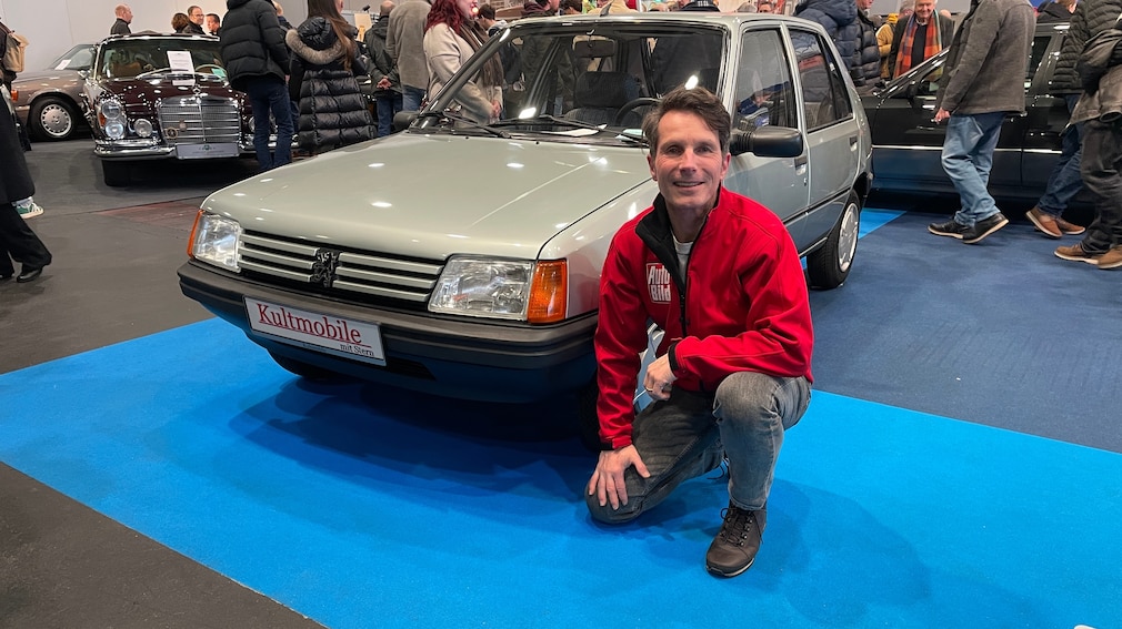 Matthias Brügge am Peugeot 205 GRD auf der Bremen Classic Motorshow