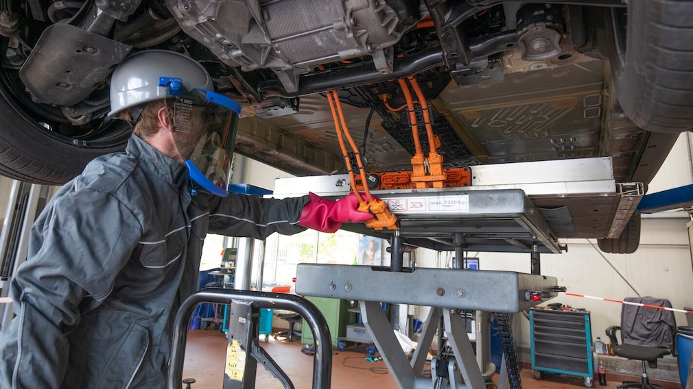 Repair Work On An Electric Car.