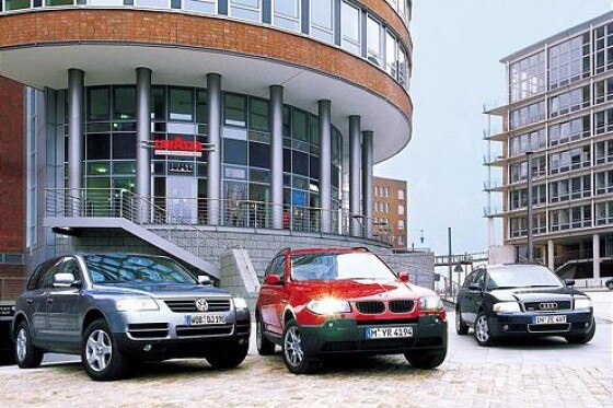 Audi A6 Avant, BMW X3 und VW Touareg Audi A6 Avant, BMW X3 und VW Touareg