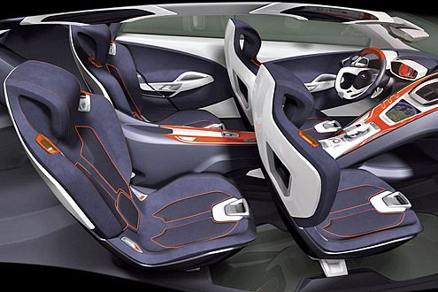 Frei schwebende Einzel-Schalensitze mit integrierten Sicherheitsgurten.