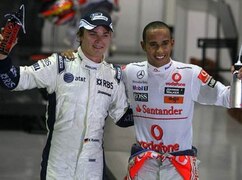 Lewis Hamilton feiert die Pole-Position mit Nico Rosberg