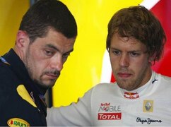Guillaume Rocquelin im Gespräch mit seinem Fahrer Sebastian Vettel