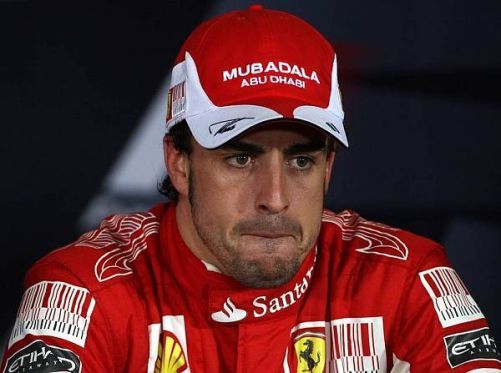 Von den McLaren-Piloten flankiert feierte Sebastian Vettel auf dem Podium
