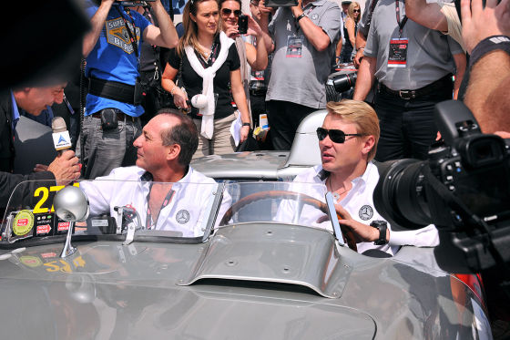 Mika Hakkinen (R) together with the grandson of Manuel Fangio