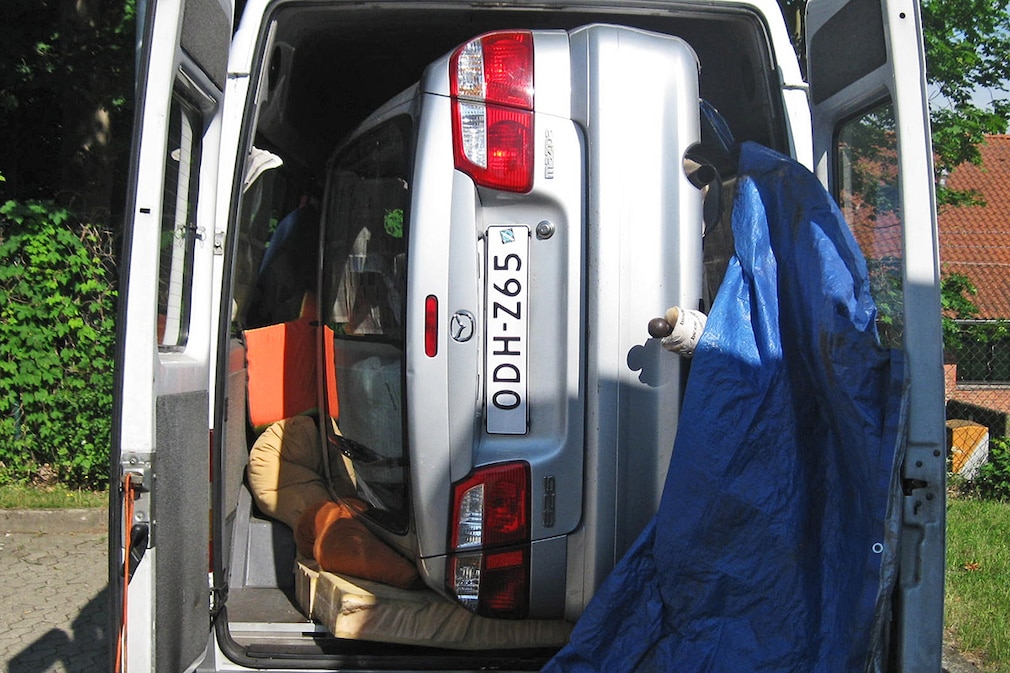 Mazda 626 in Mercedes Sprinter Transporter